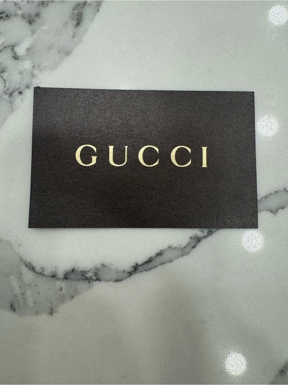 Gucci Black Embossed GG Leather Wallet